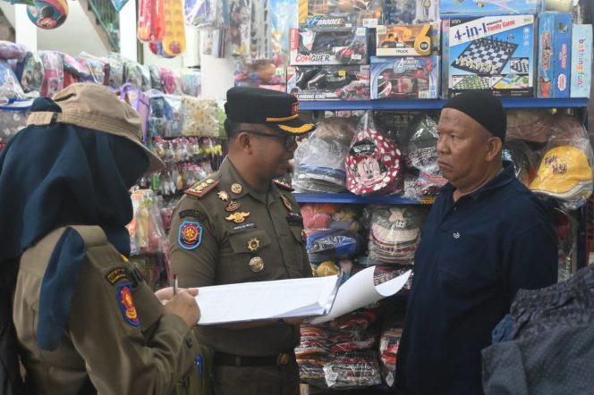 
 Pj Bupati Erisman Yahya Tetapkan Kebijakan Penataan Pusat Perbelanjaan dan Toko Swalayan